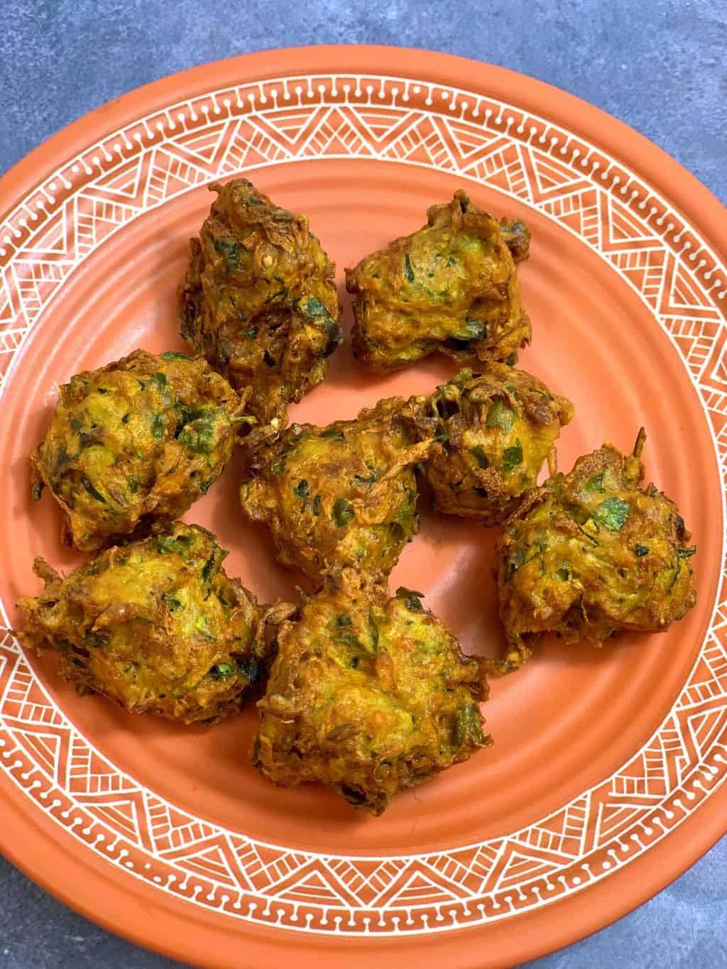 Zucchini Pakoda or zucchini fritters indian style served on a plate