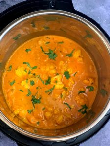 pressure cooked cauliflower coconut curry in the instant pot insert