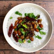 Chia Seeds Curd rice served in a white bowl with tempering on top