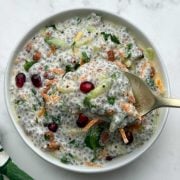 Savory chia seeds curd rice served in a bowl with a spoonful of creamy chia curd.