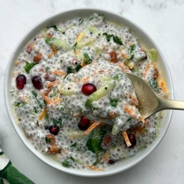 Savory chia seeds curd rice served in a bowl with a spoonful of creamy chia curd.