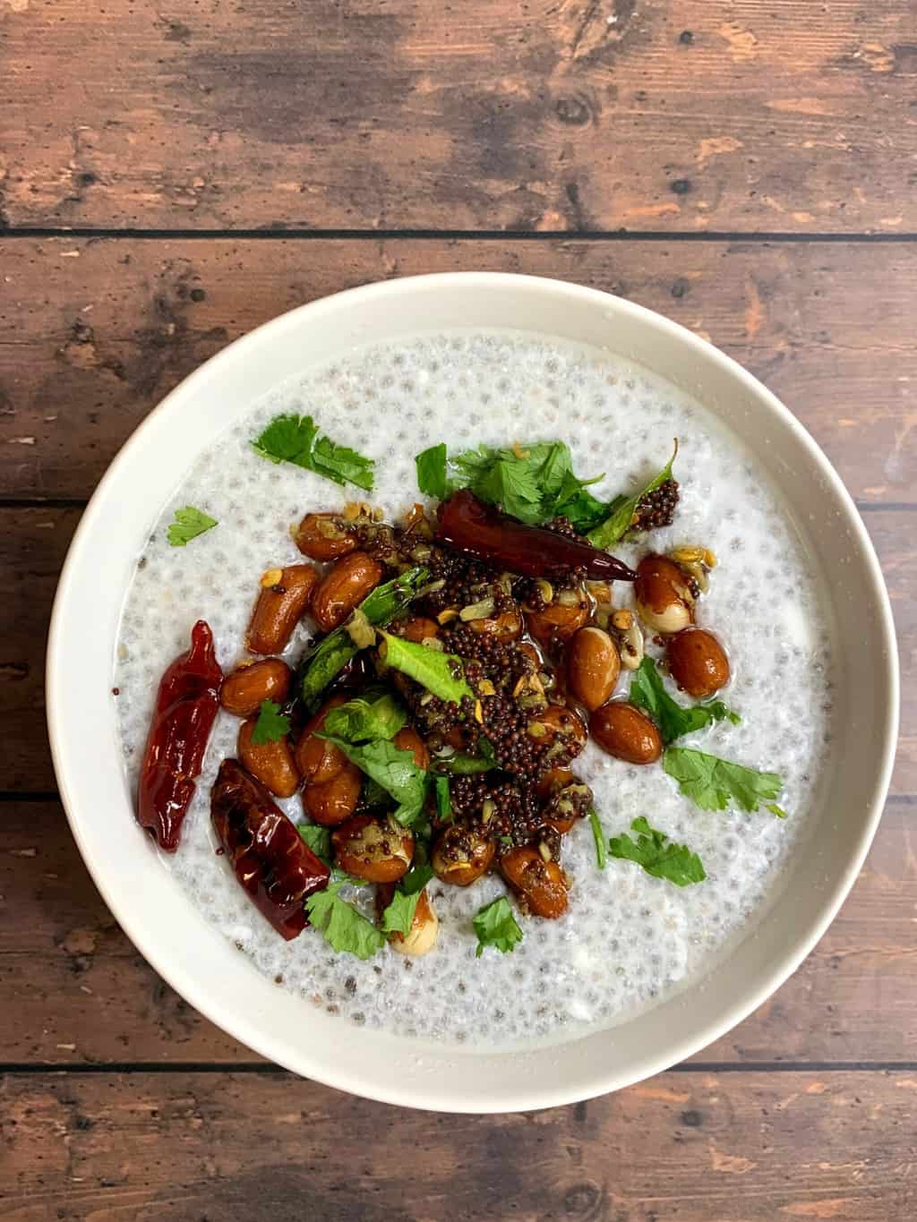 chia curd rice served in a bowl with tempering on the top