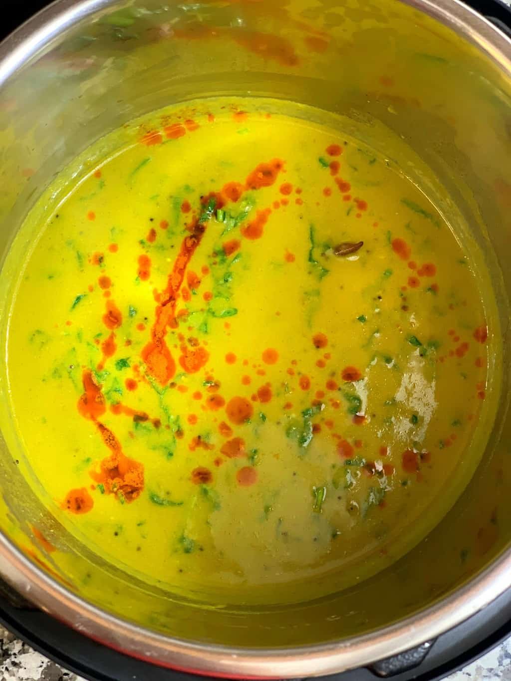 palak kadhi in instant pot insert with tempering on the top 
