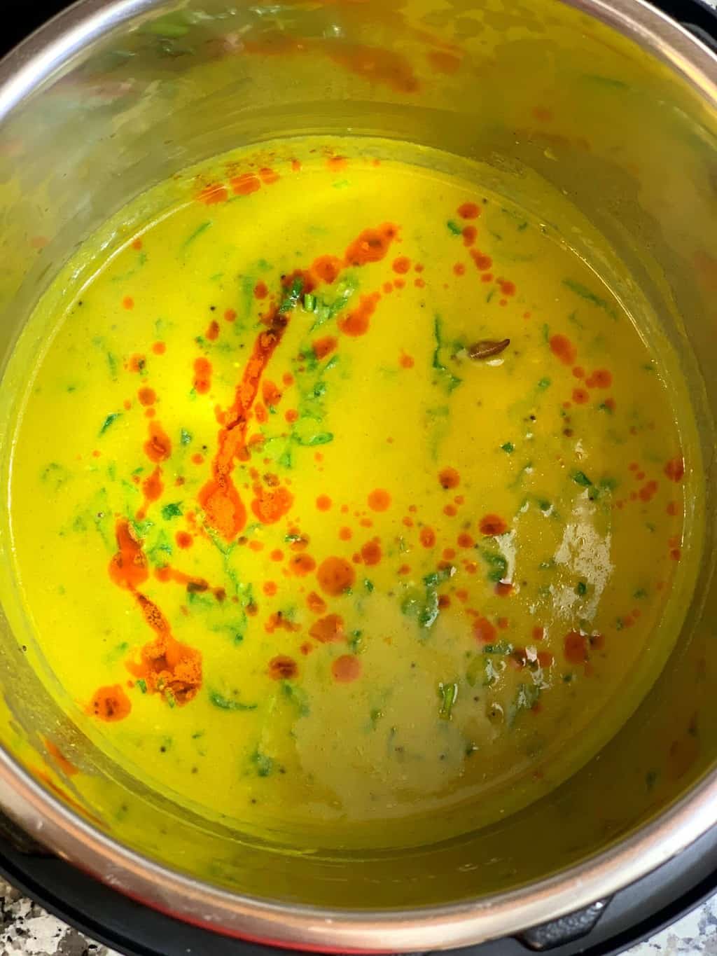 palak kadhi in instant pot insert with tempering on the top 