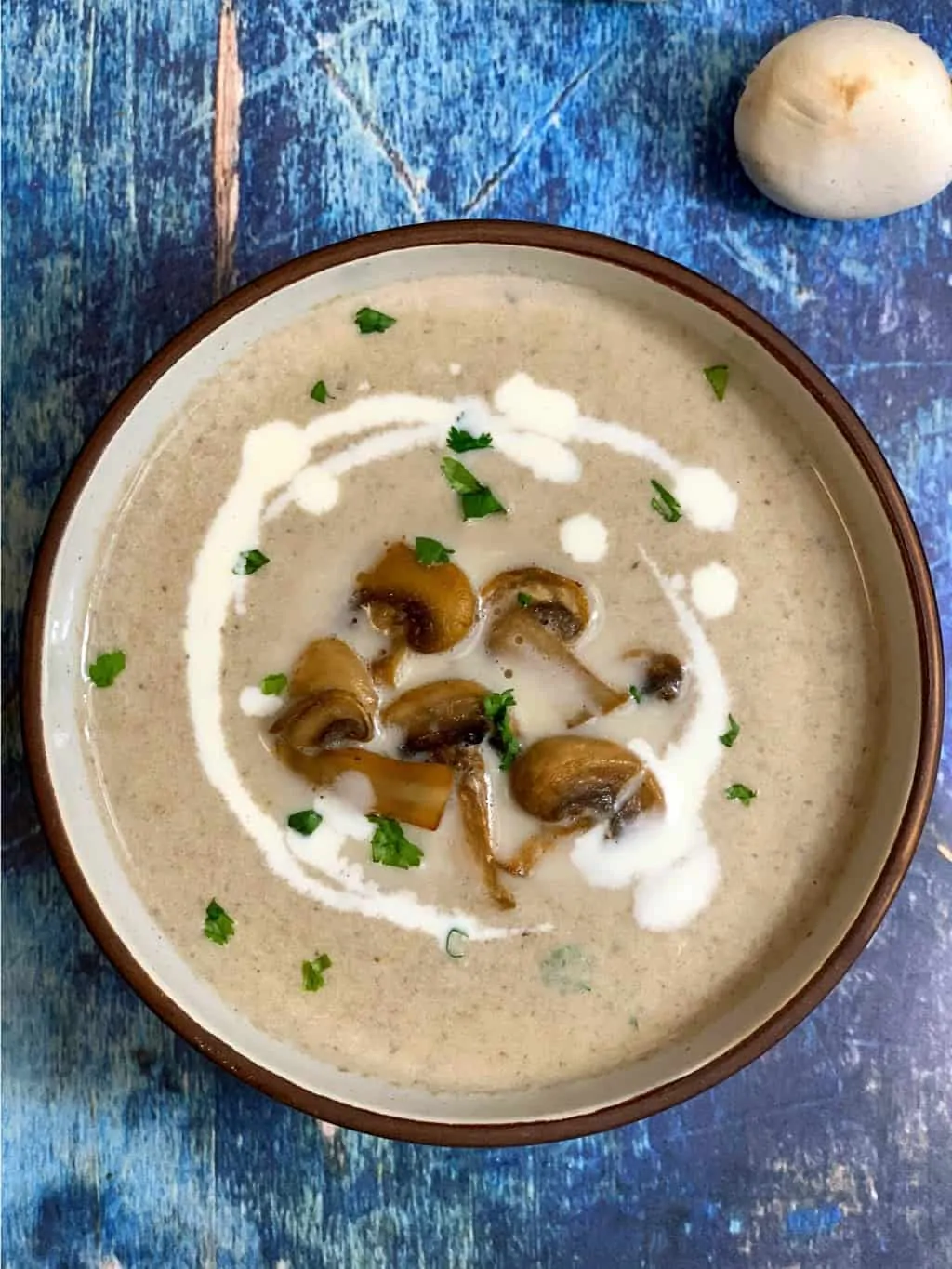 instant pot creamy mushroom soup served in a serving bowl