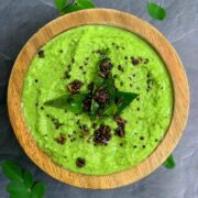 Moringa leaves Coconut Chutney served in a bowl with tempering on the top