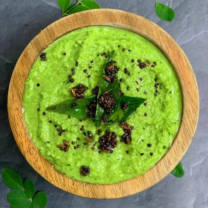 Moringa leaves Coconut Chutney served in a bowl with tempering on the top