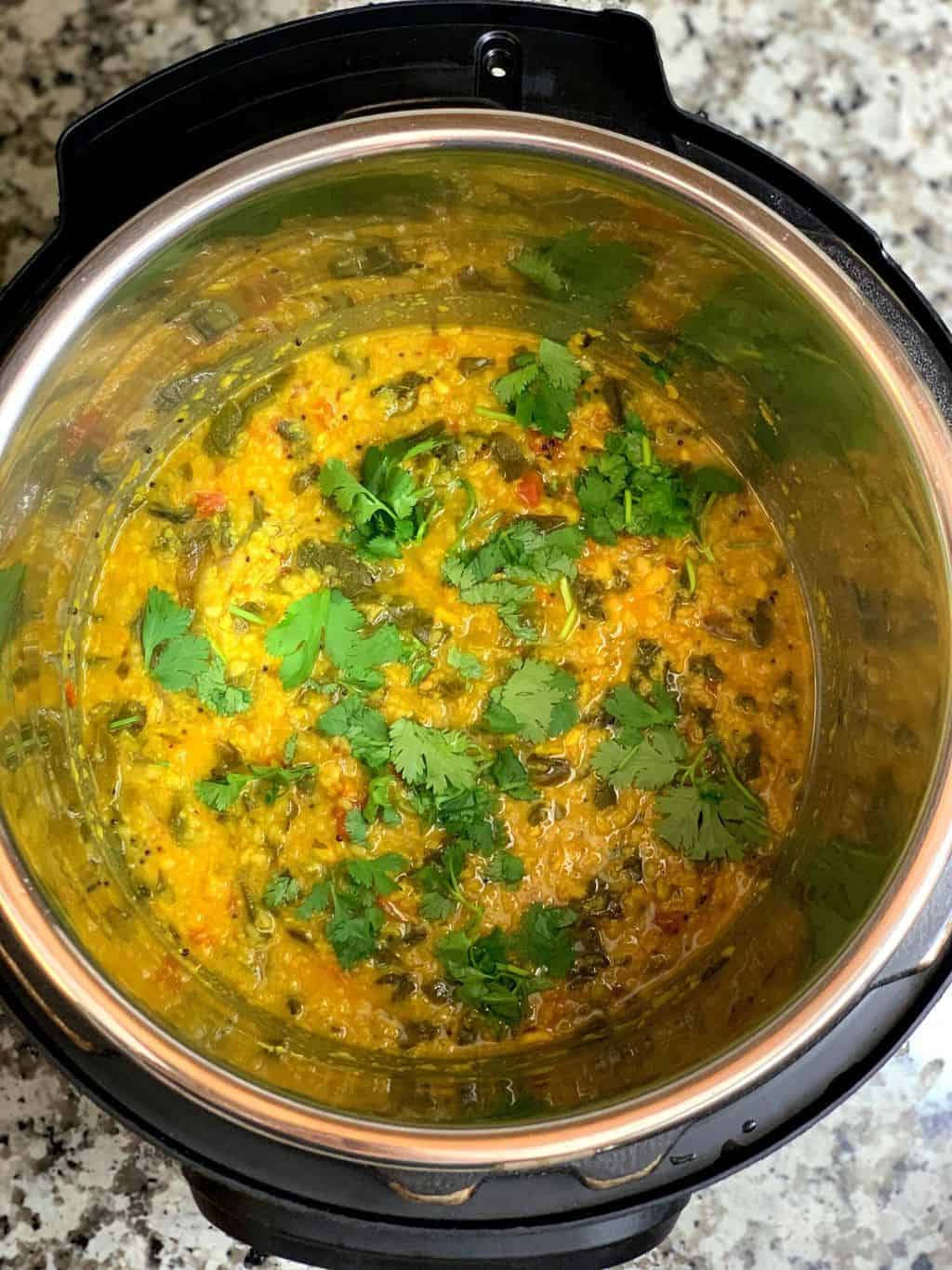moringa dal in instant pot insert garnished with cilantro