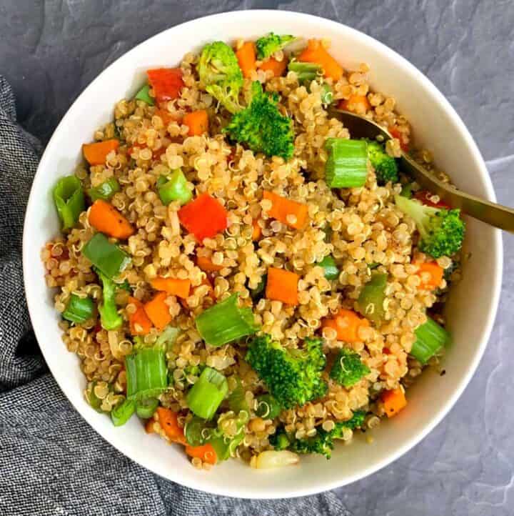 Vegetable Quinoa Fried Rice served in a white bowl