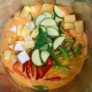 veggies lime leaves and soy sauce in thai red curry