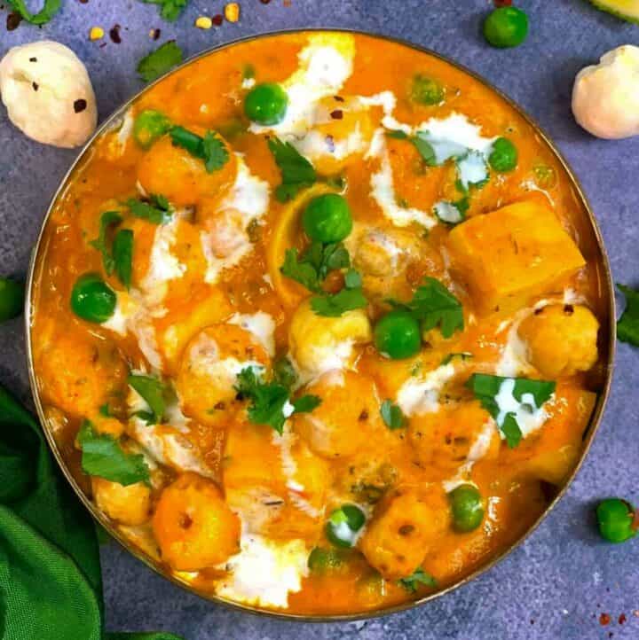 Paneer Matar Makhana Curry served in a copper bottom bowl