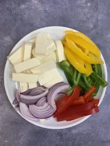 sliced vegetables and paneer lengthwise for jalfrezi