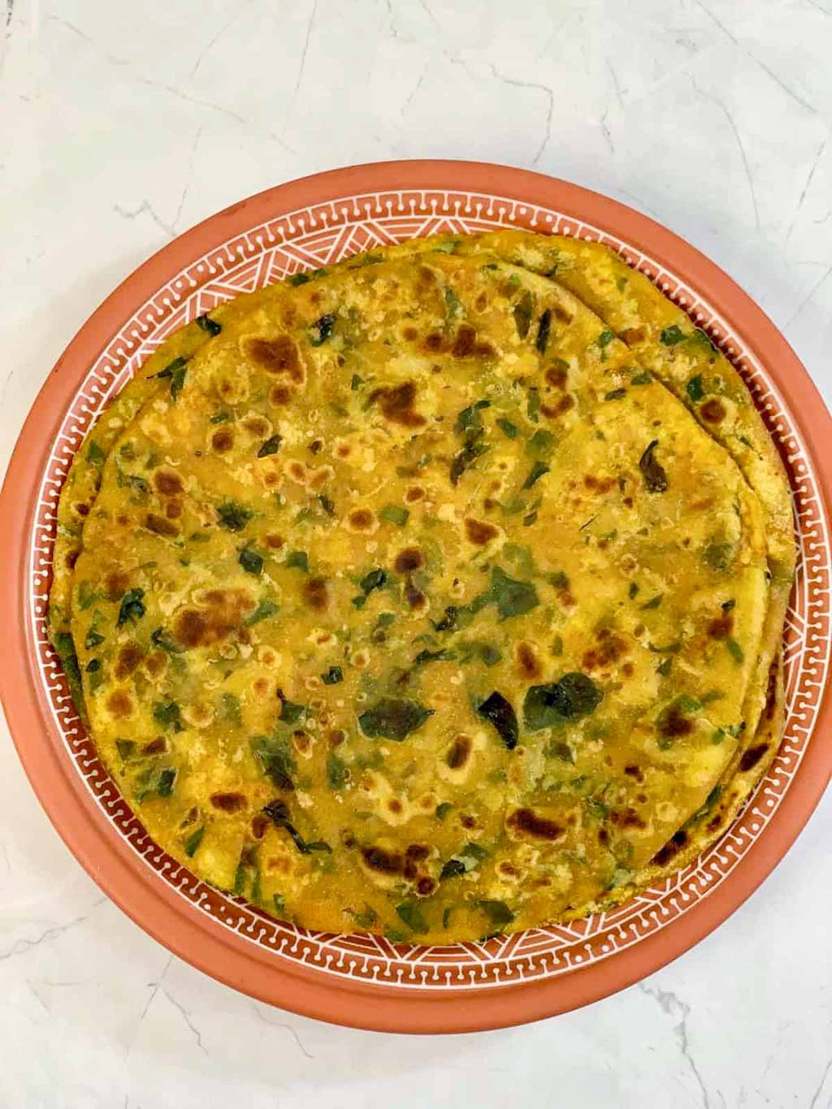 Moringa Leaves Paratha served on a plate