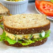 chickpea salad sandwich served with veggies on the side