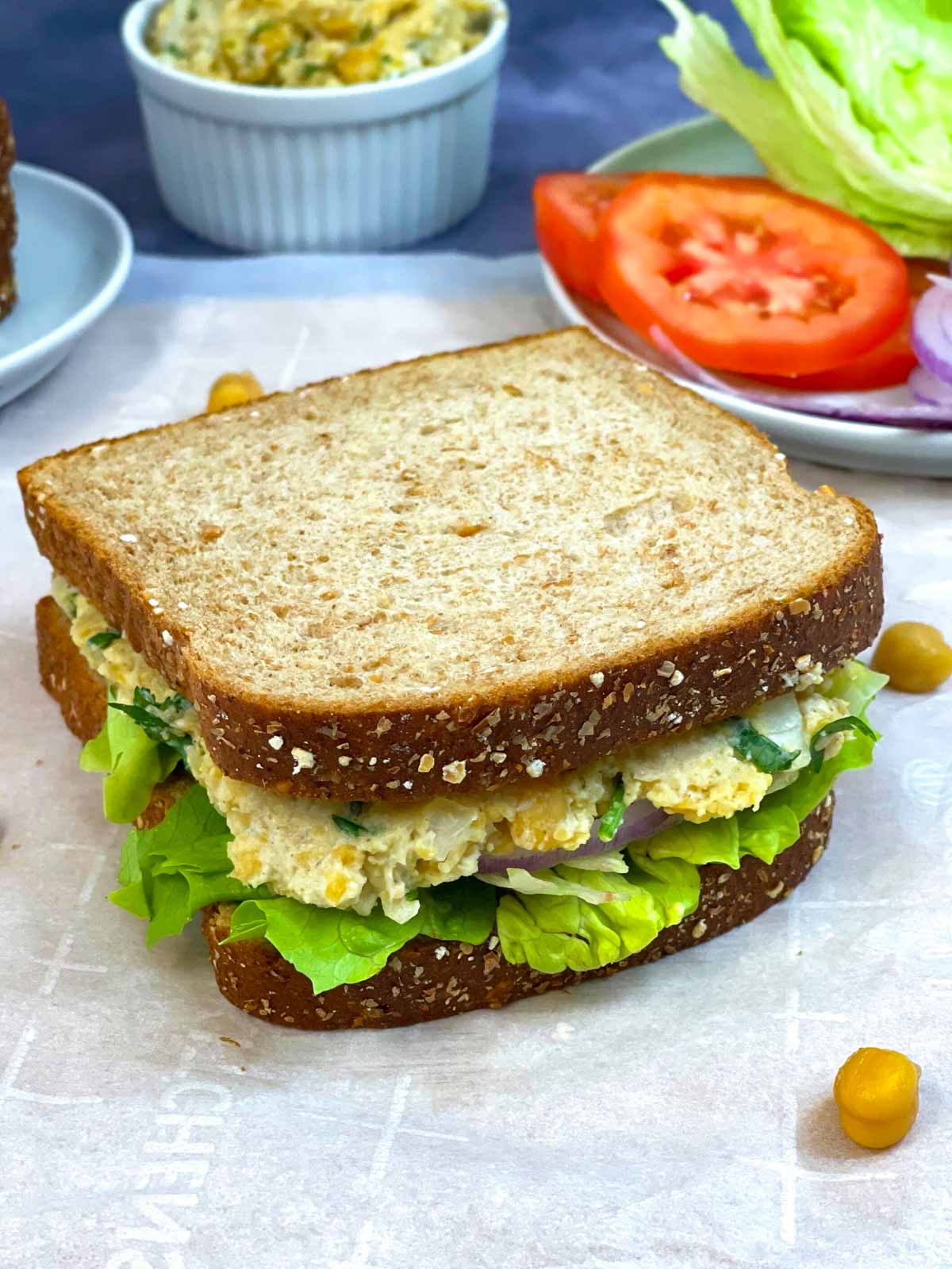 chickpea salad sandwich recipes served with veggies on the side