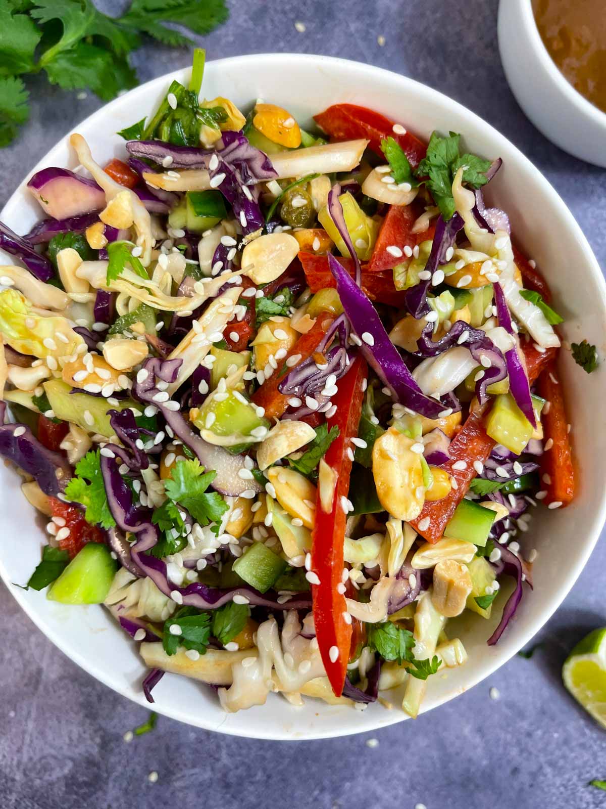 crunchy thai peanut salad served in a bowl 