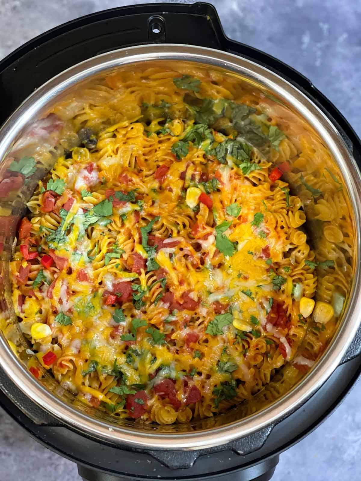 mexican pasta in the pot garnished with cilantro