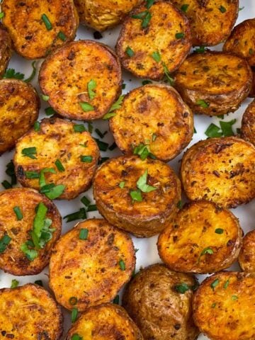 air fryer roasted bay potatoes serve don a plate garnished with parsley