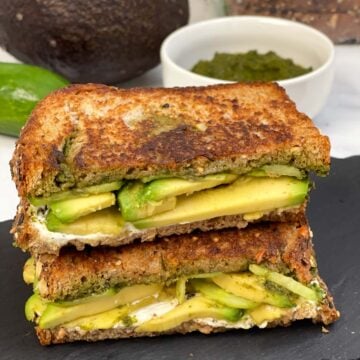 grilled avocado chutney sandwich placed one above the other