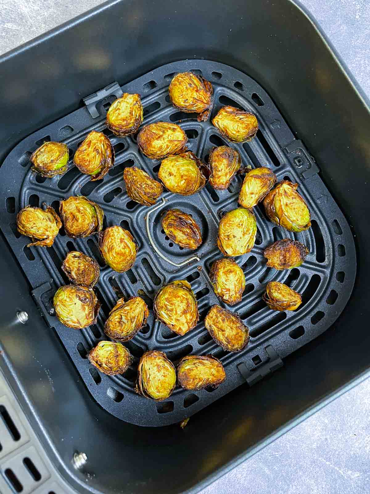 roasted air fried brussels sprouts in a basket