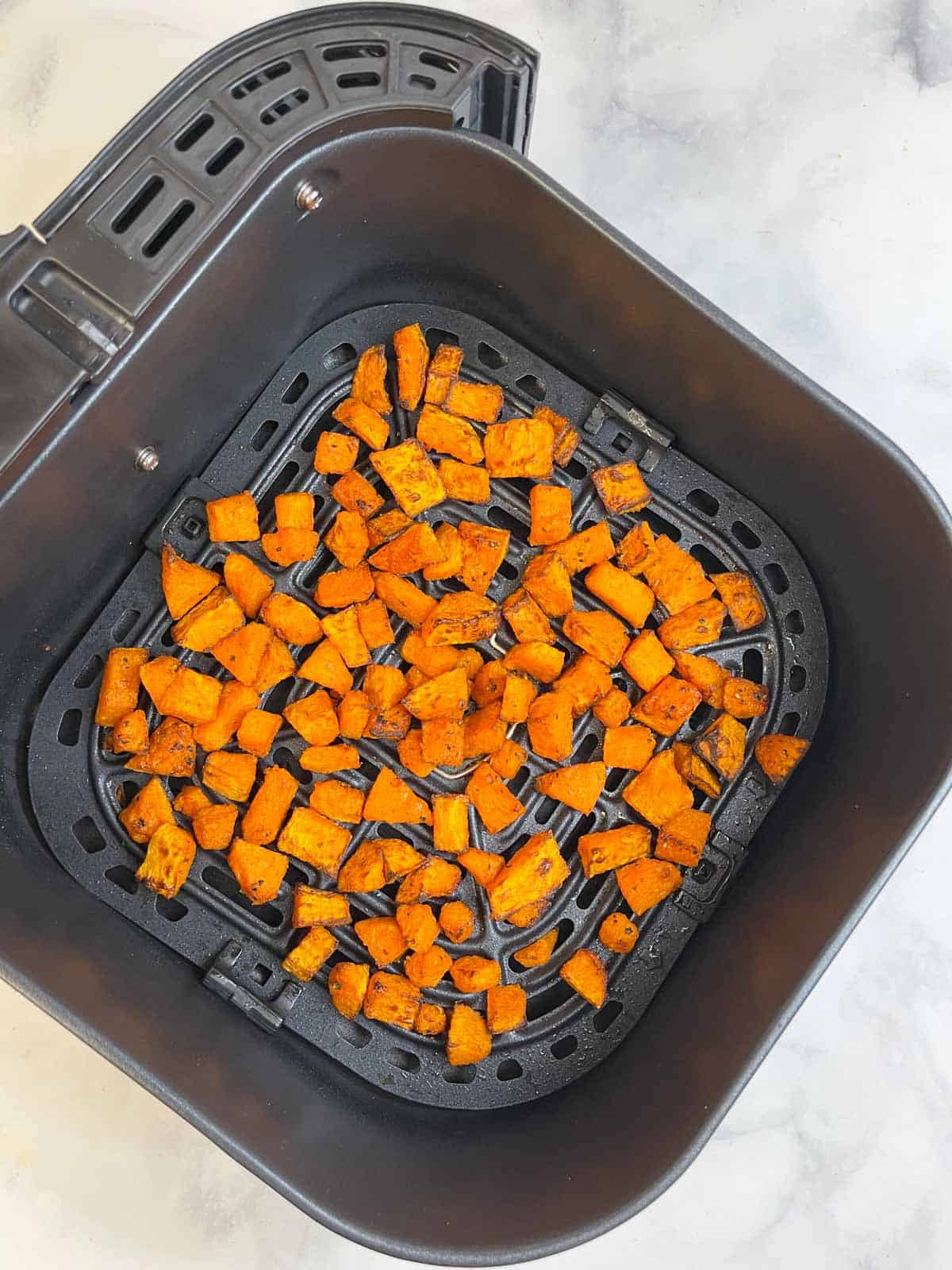 air fried butternut squash in the basket