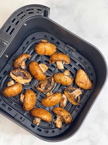 seasoned mushrooms in the air fryer basket