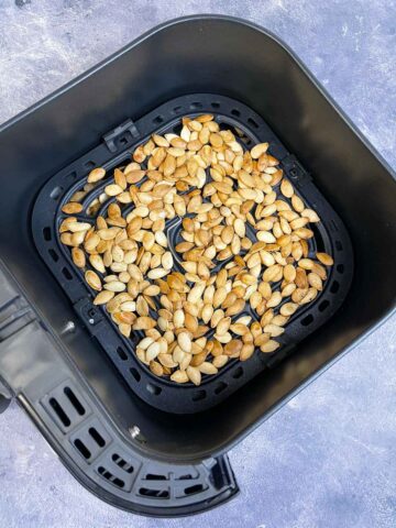 roasted pumpkin seeds in the air fryer basket