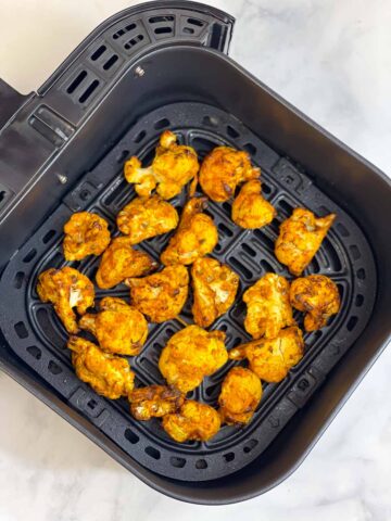 air fried cauliflower tikka bites in the basket