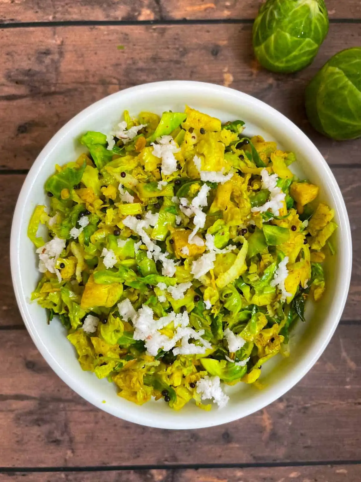 brussels sprouts poriyal served on a bowl