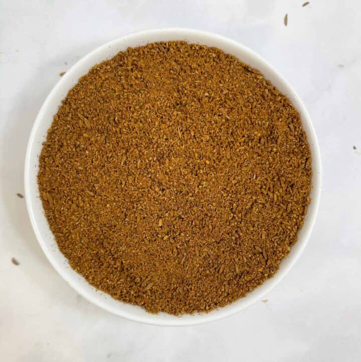 roasted cumin powder served in a bowl