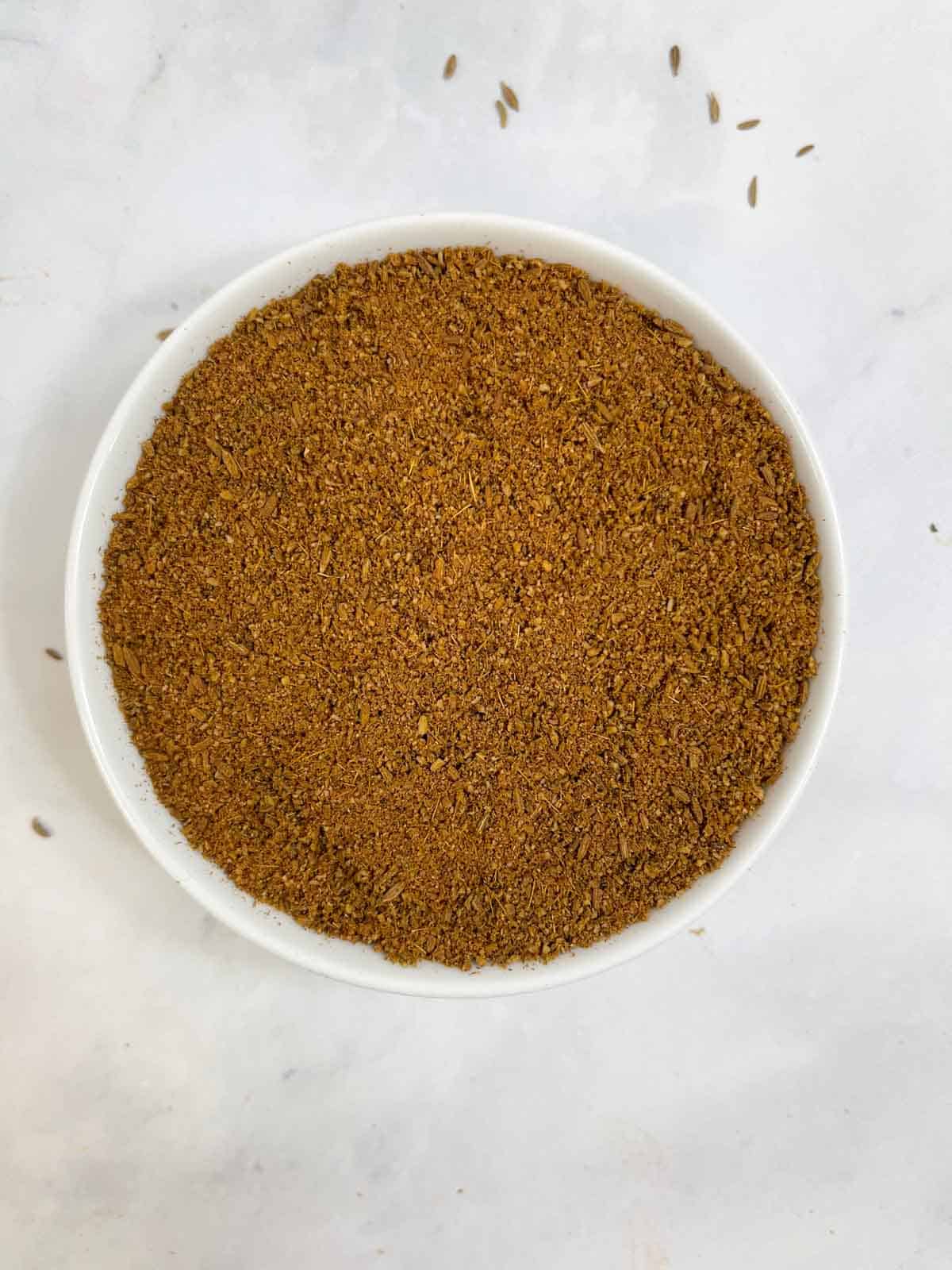 roasted cumin powder served in a bowl