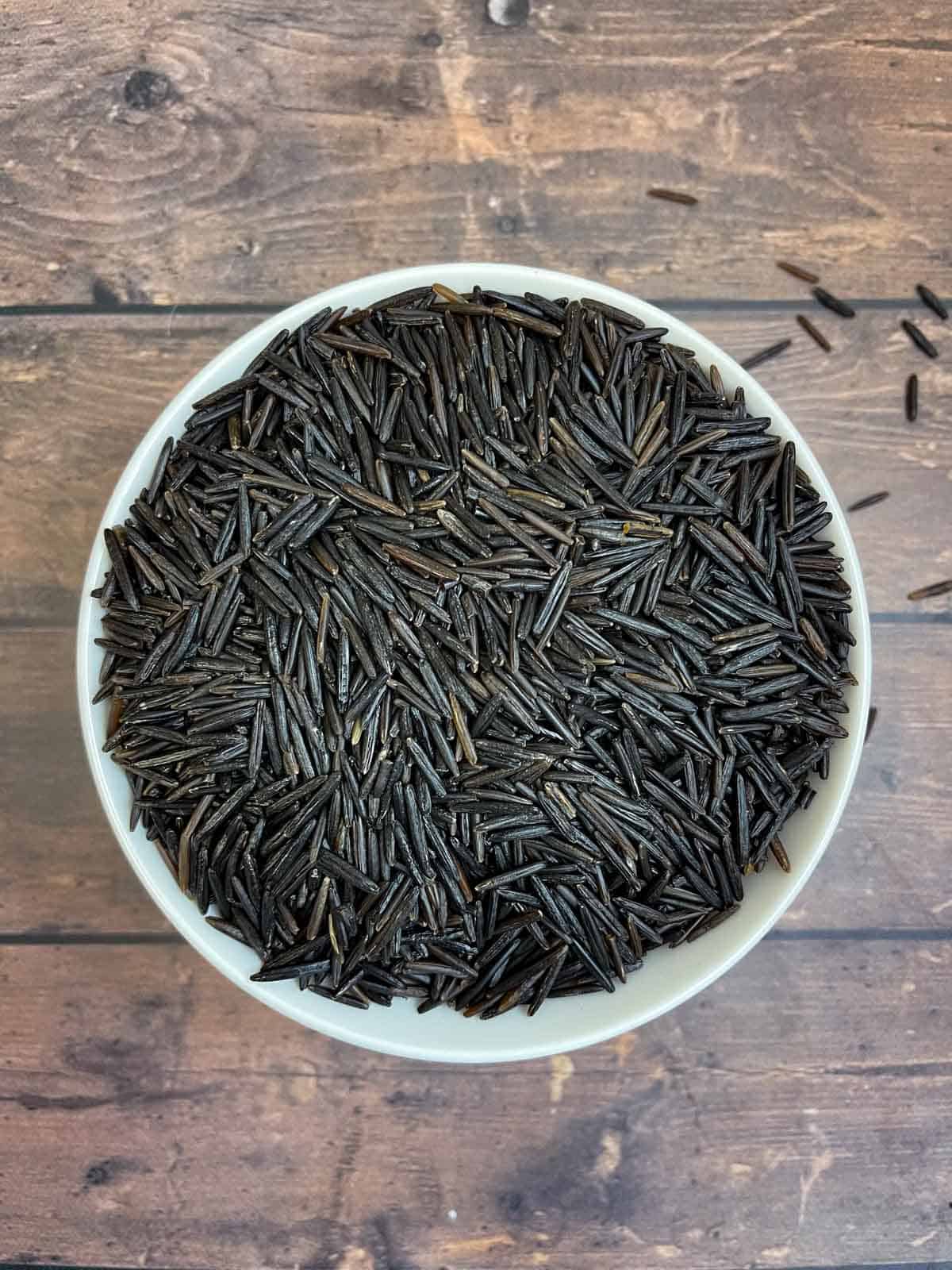 uncooked wild rice in a bowl