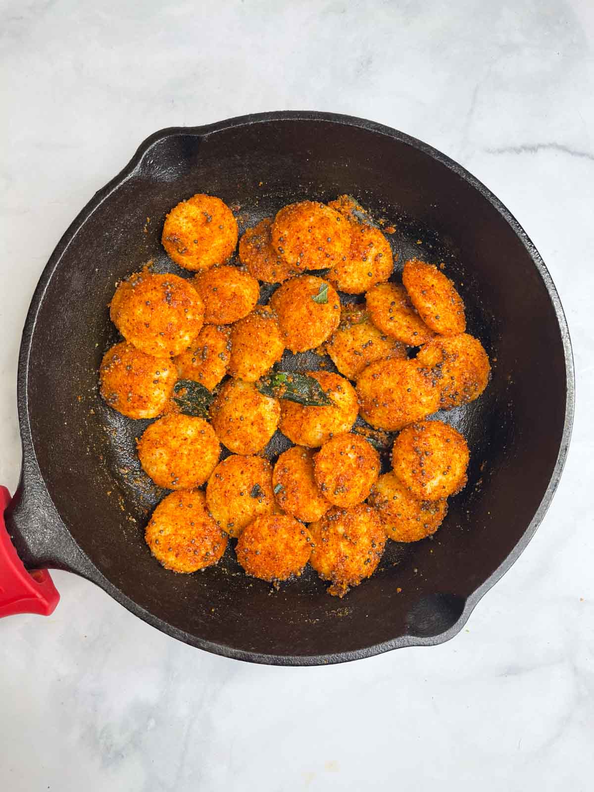 ghee milage idli in cast iron tawa