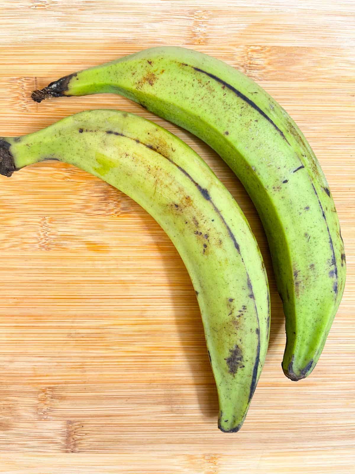 two plantains on the wooden board