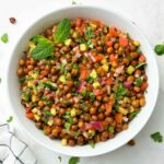 kala chana salad (black chickpeas salad) served in a bowl garnished with mint