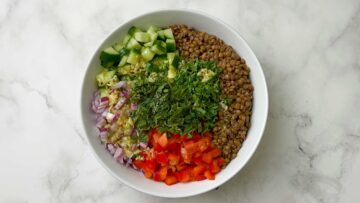 step to pour dressing over the lentil salad recipe