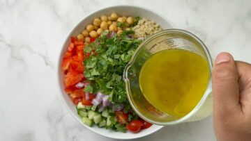 step to pour the dressing over the salad