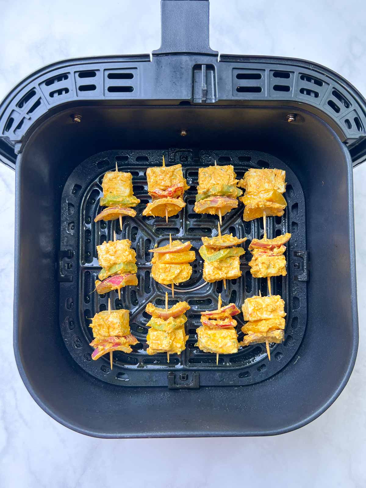 step to line the skewers in the basket