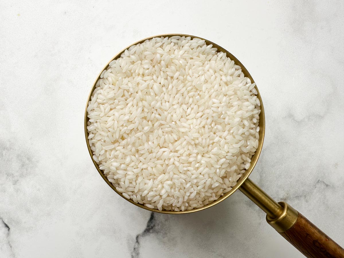 seeraga samba rice in a measuring cup