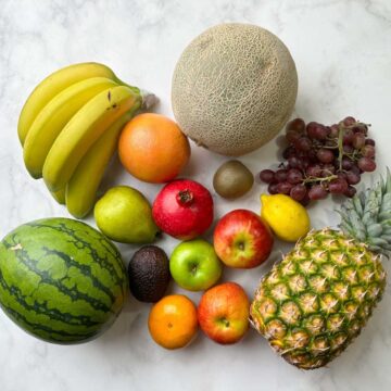 a collection of fruits on a sheet