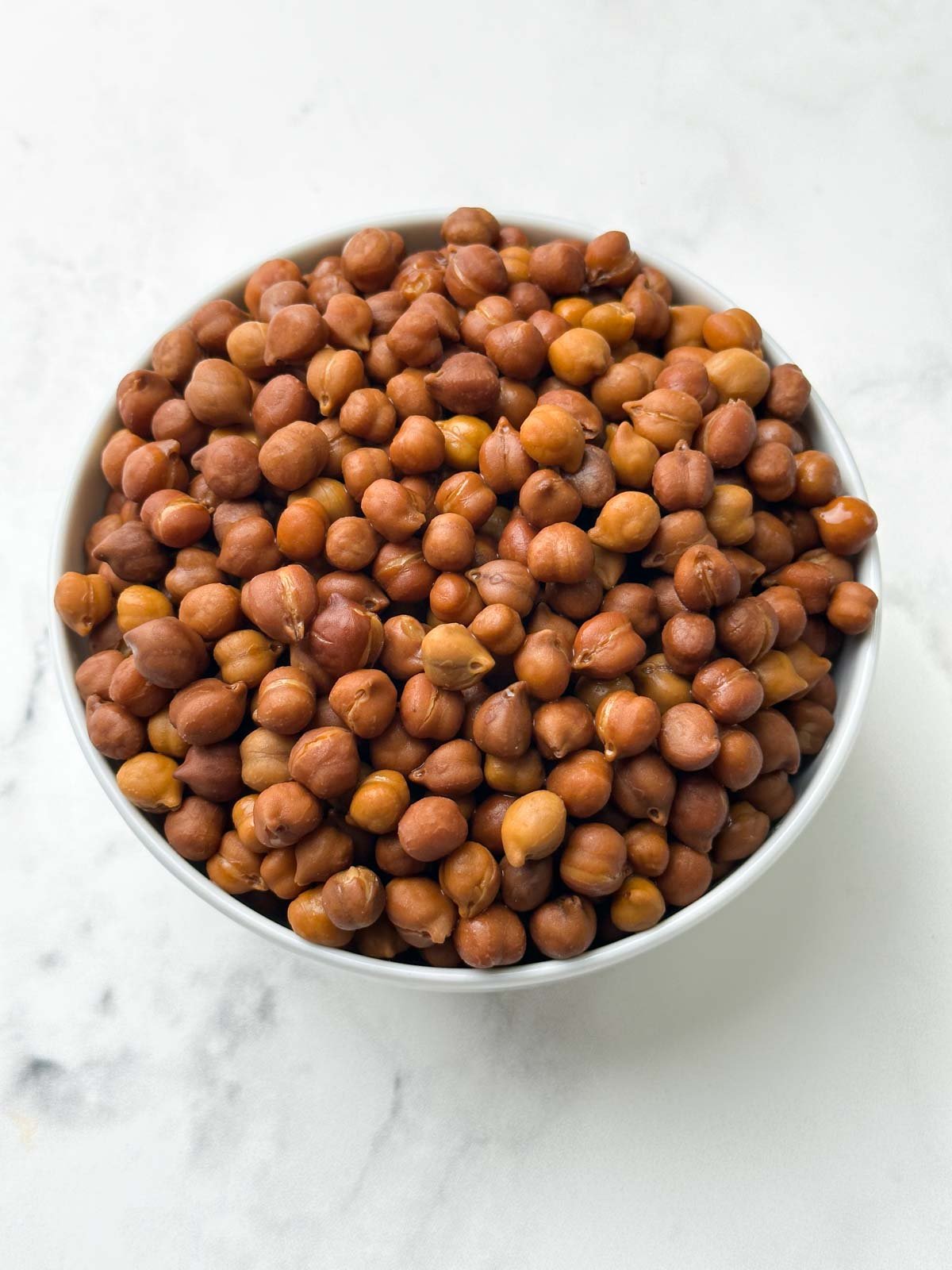 cooked pressure cooker kala chana in a bowl