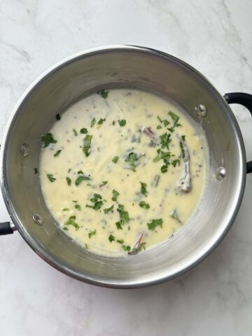 gujarati kadhi in a steel kadai