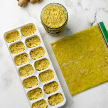 ginger paste stored in ice cube tray, zip-lock cover and glass jar