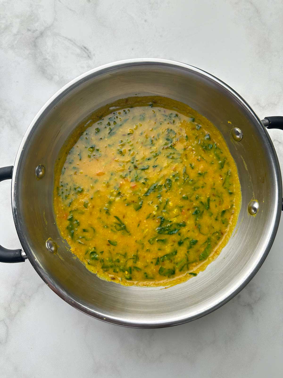 palak dal in a kadai