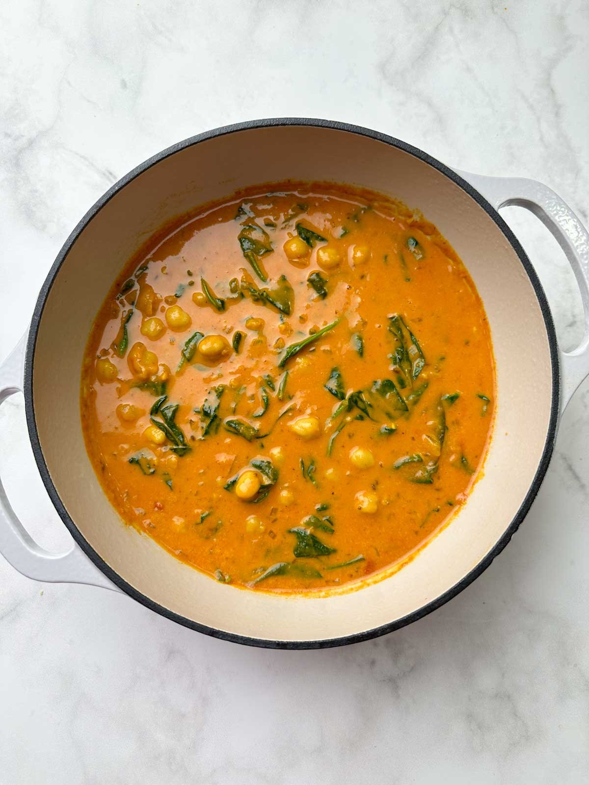 chickpea spinach curry in the dutch oven