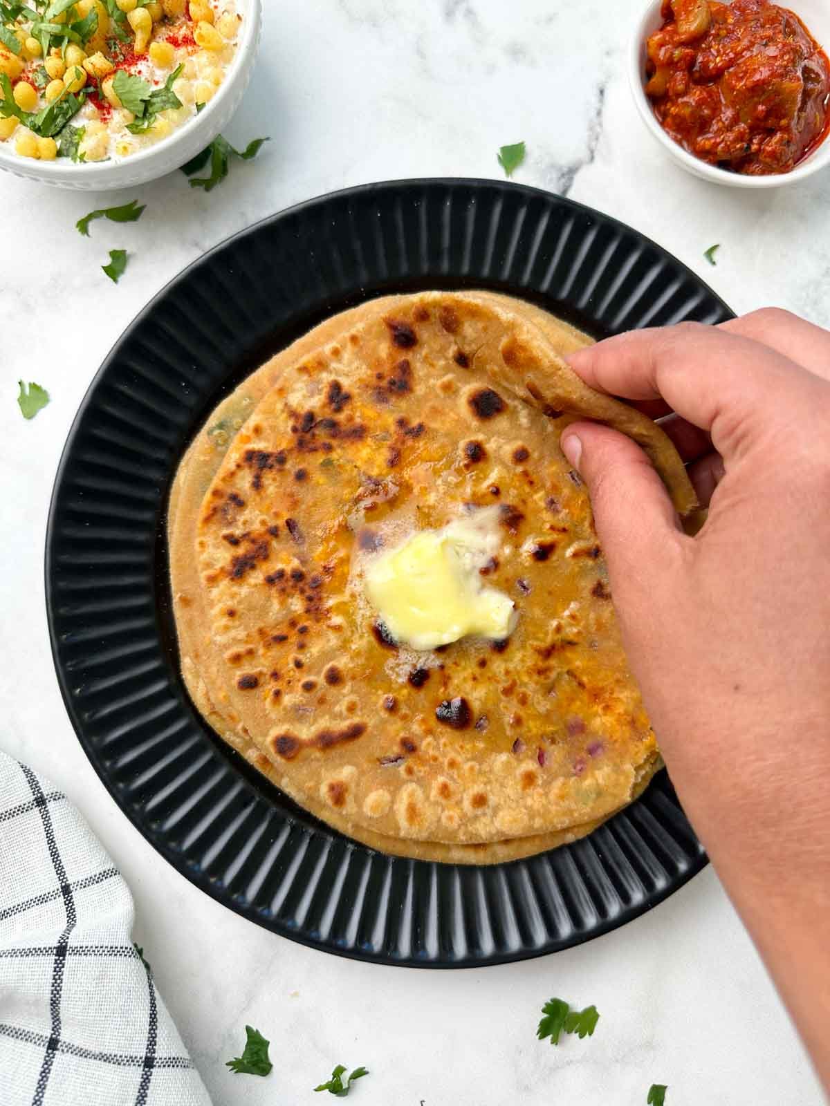 holding paneer paratha