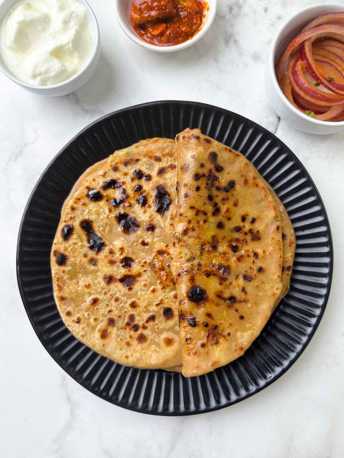 potato parathas stacked and folder