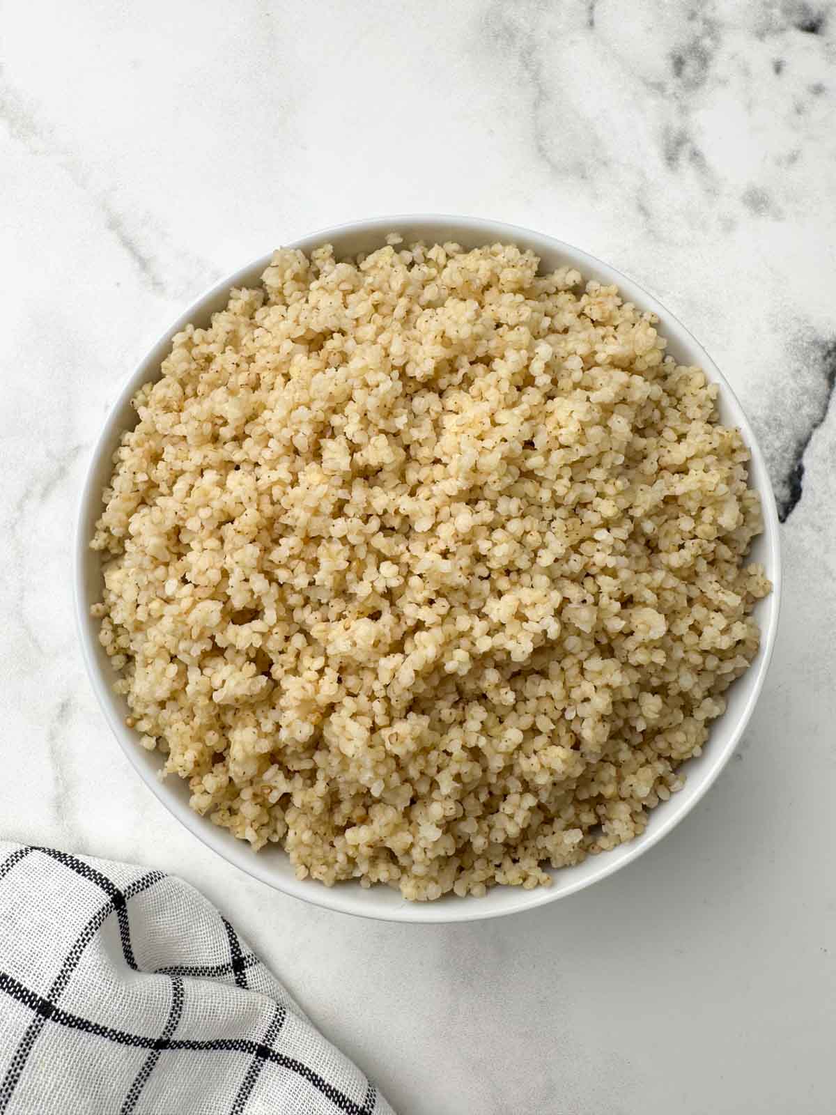 perfectly cooked foxtail millet in instant pot pressure cooker served in a bowl