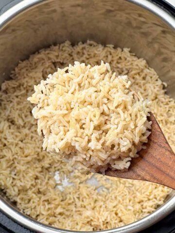 brown basmati rice in a laddle
