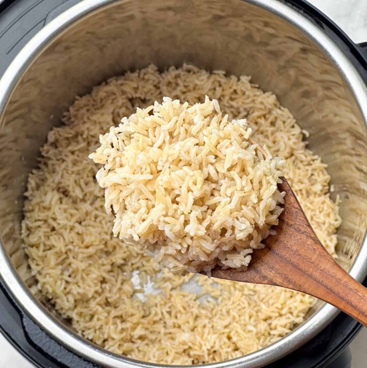 brown basmati rice in a laddle